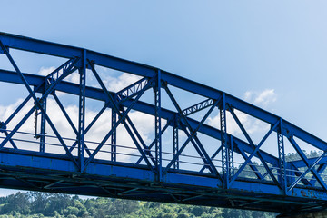 Obraz premium iron bridge for railroad crossing the sea to the other side of the bay