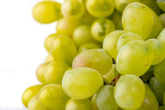 Macro Photo food green grapes berries. Image fresh berries fruit white grapes on branch
