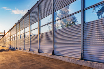 Part of the noise protection fence along the road.