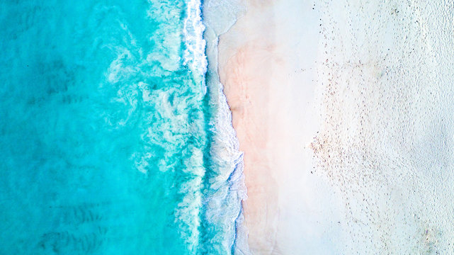 Crystal Clear Ocean Water Laps At The Shoreline.