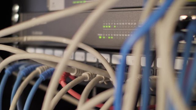 Ethernet Server in a data center with cables and flashing lights