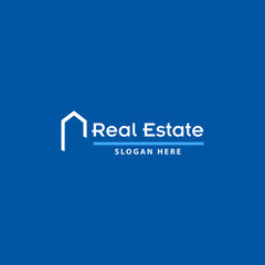 real estate business logo on blue background with white letters