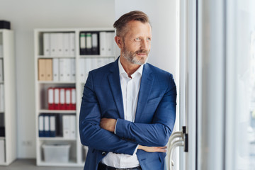 Fototapeta premium Stylish businessman standing waiting for a client