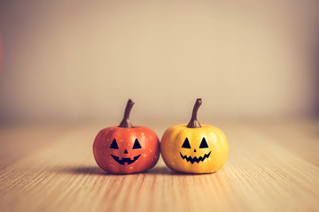 Happy Halloween concept, Pumpkin on wood background.