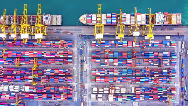 4K. Time lapse Industrial port with Container port where is a part of shipping and Cargo ship