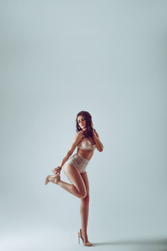 Studio portrait of seductive woman wearing underwear