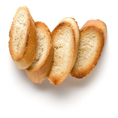 Toasted baguette slices isolated on white background close up.  Toast, crouton.   Top view.
