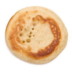 One pancake isolated on white background cutout. Top view.