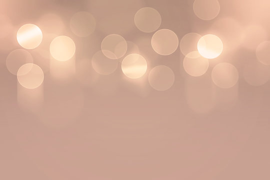 Abstract rose gold bokeh background	