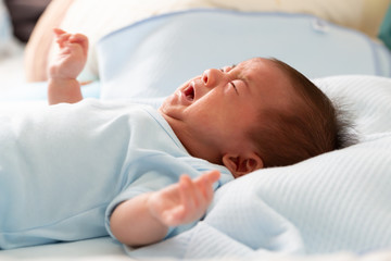Asian baby newborn crying from diarrhea colic symptoms - obrazy, fototapety, plakaty