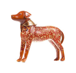 Dog statuette isolated on white background