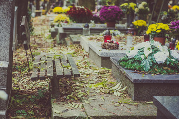 nostalgic and sad All Saints Day in the autumnal cemetery