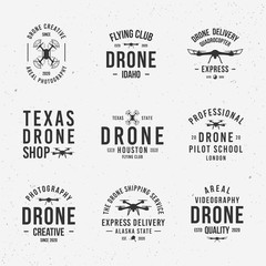 Collection of Drone logos, emblems, labels, badges. Set of 9 logo templates. Drone business. Vector illustration