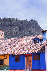 Colonial style houses. La Candelaria, Bogota. Blue house in the spanish colonial neighborhood of La Candelaria, Bogota, Colombia