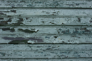 Old cracked paint on wooden wall 
