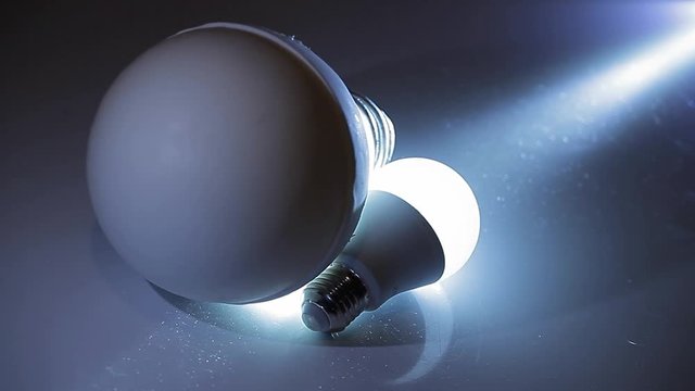 electric bulb white metal background 