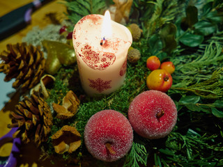 Burning candle festive Christmas decoration