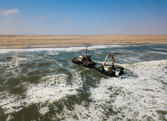 Abandoned and derelict old shipwreck Zeila at the Atlantic Coast near Swakopmund and famous...