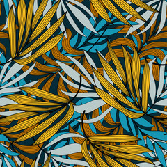 Seamless tropical pattern with plants and leaves in yellow and blue tones. Colorful stylish floral. Beautiful exotic plants. Hawaiian style.