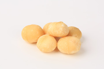 macadamia nuts on a white background