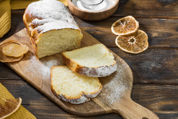 Homemade cottage cheese pie on a wooden table. Traditional dessert. Rustic style