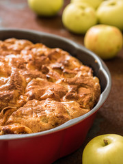 Closeup homemade apple pie with cinnamon. Useful dessert. Charlotte. Healthy food