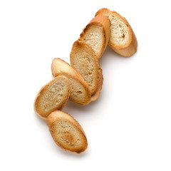 Toasted baguette slices isolated on white background close up.  Toast, crouton.   Top view.