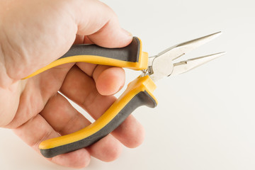 pliers with a long working part and dielectric handles