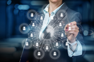 Businessman draws a global network of clients .