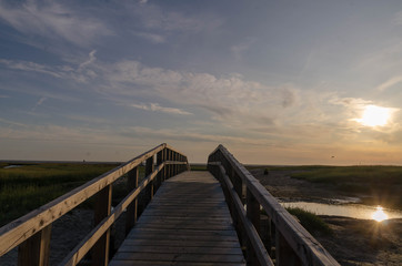 Fototapeta premium Sankt Peter-Ording Sonnenuntergang Holzbrücke