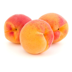 three apricot fruit isolated on white background cutout
