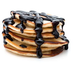 Pancakes  stack with chocolate syrup on white background