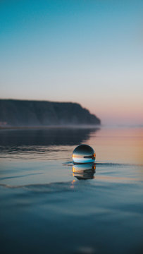 Ball floating on sea