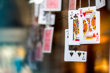 Playing cards hanging