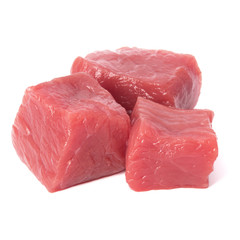 Raw chopped beef meat pieces isolated om white background cut out.