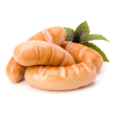 Roasted smoked sausages isolated on white background cutout