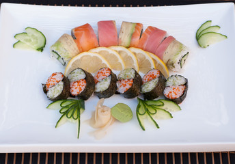 A dish with a delicious Japanese sushi