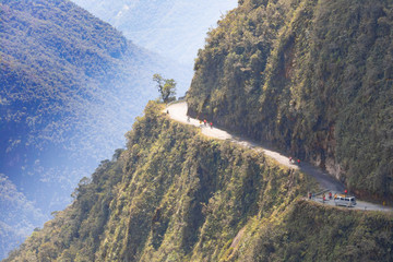 Bolivia,  cyclists on death road panoramic view