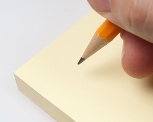 Writing on a memo, close up photo