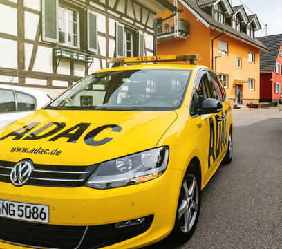 DURBACH, GERMANY - APR 29, 2018: Security safety car from the ADAC driving on calm German city of Durbach. ADAC is the abbreviation of Allgemeiner Deutscher Automobil-Club