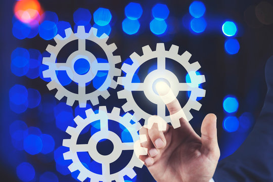 man touching gear network in screen