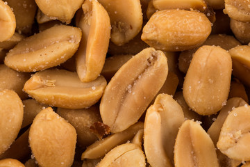 large amount of peeled salted peanuts