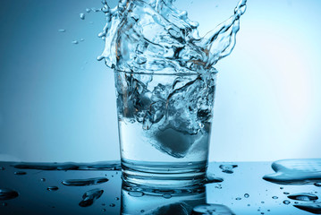 drops of water on the glass. Rainbow, multicolored abstract background.