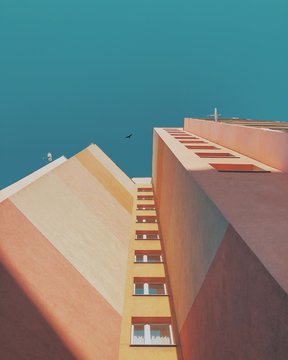 Low Angle View Of Building Against Blue Sky