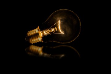 light bulb on black background