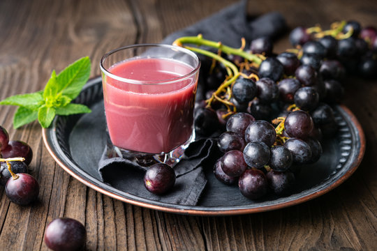 Seasonal Homemade Drink, Freshly Made Grape Juice In Glass Jar