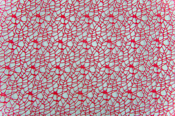 red mesh background on a white background