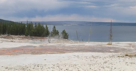 Yellowstone Lake West Thumb Geyser Basin. Geothermal ecosystem Caldera. Biology geography and ecology. Millions of tourist and visitors each year.