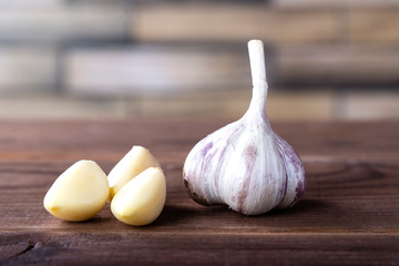 garlic on a wooden table. Healthy spices, healthy food
