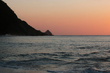 Sunset at Fernando de Noronha with Dois Irmãos Mount in the Background
